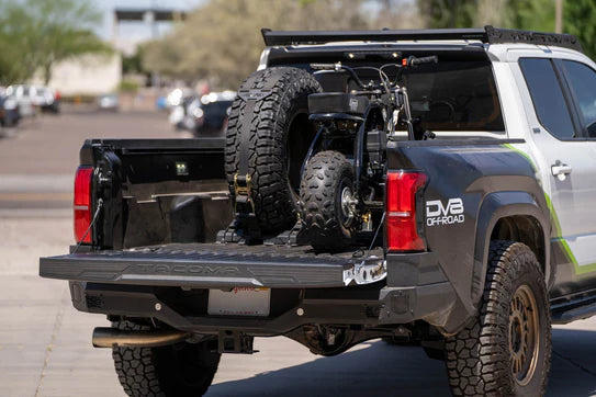 DV8 Off Road - Truck Bed Universal Tire Carrier & Accessory Mount