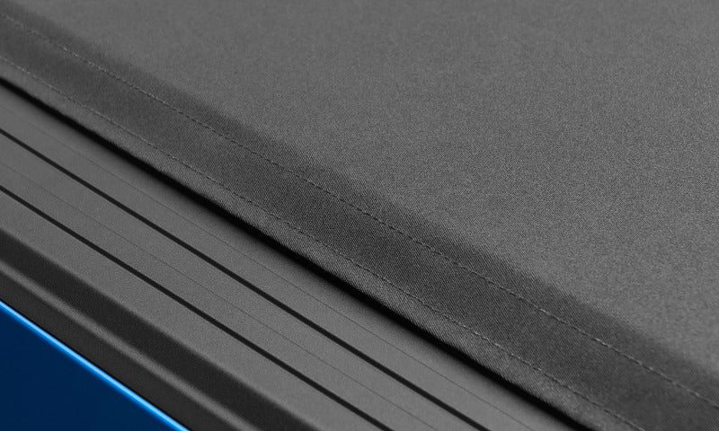 Lund 04-18 Ford F-150 (5.5ft. Bed) Genesis Elite Roll Up Tonneau Cover - Black